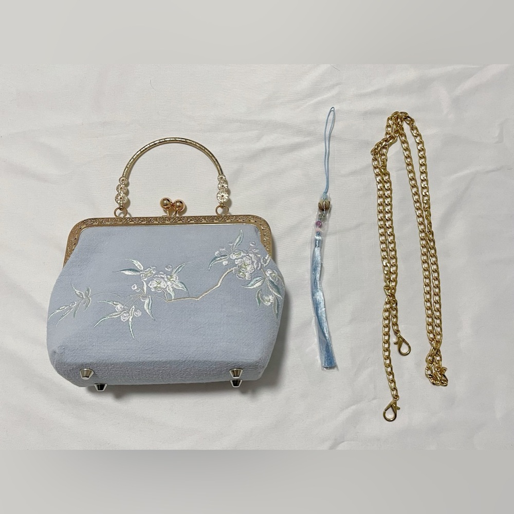 Elegant Light Blue Embroidered Satin Clutch with Gold Frame